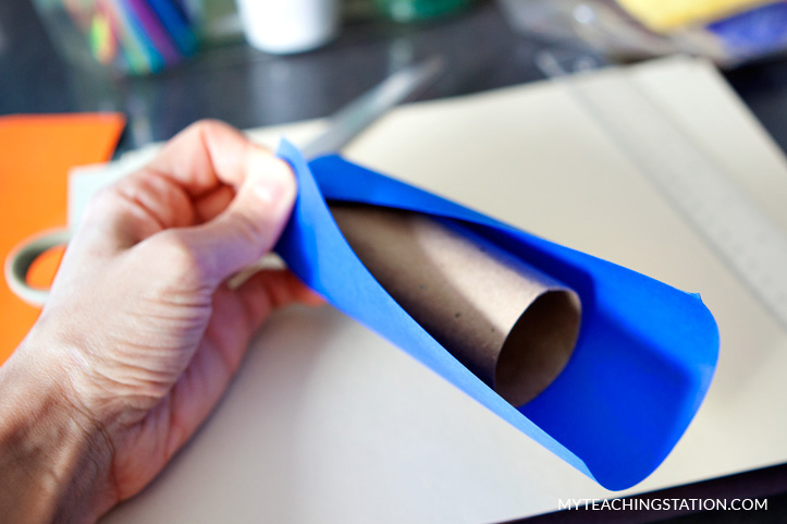 Wrap color paper around toilet paper roll