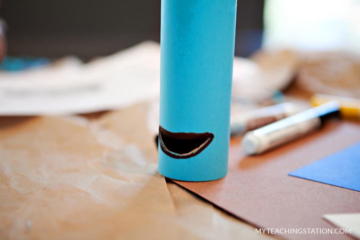 Use a marker to draw a line around the mouth opening in the toilet paper roll.