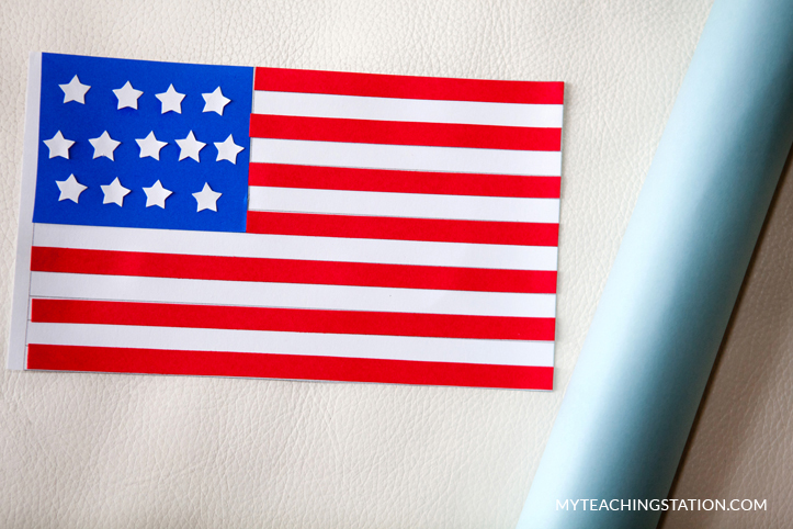 Place the U.S. flag cut outs onto the template to make kids art craft.