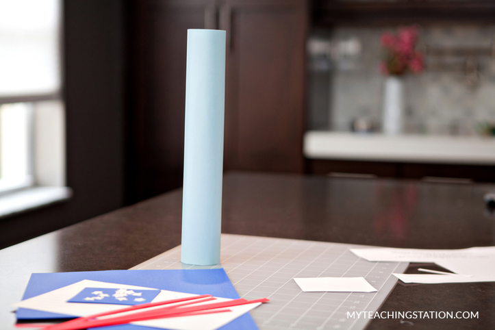 Create the U.S. flag pole with the paper towel roll to make the kids art craft.