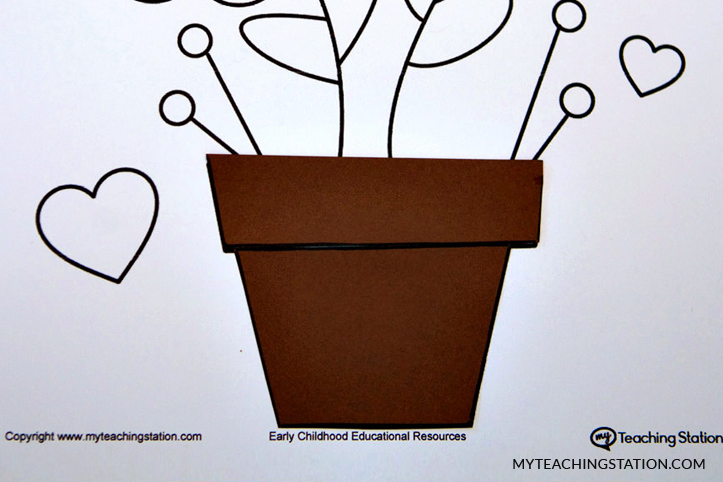 Glue brown paper into the flower pot template.